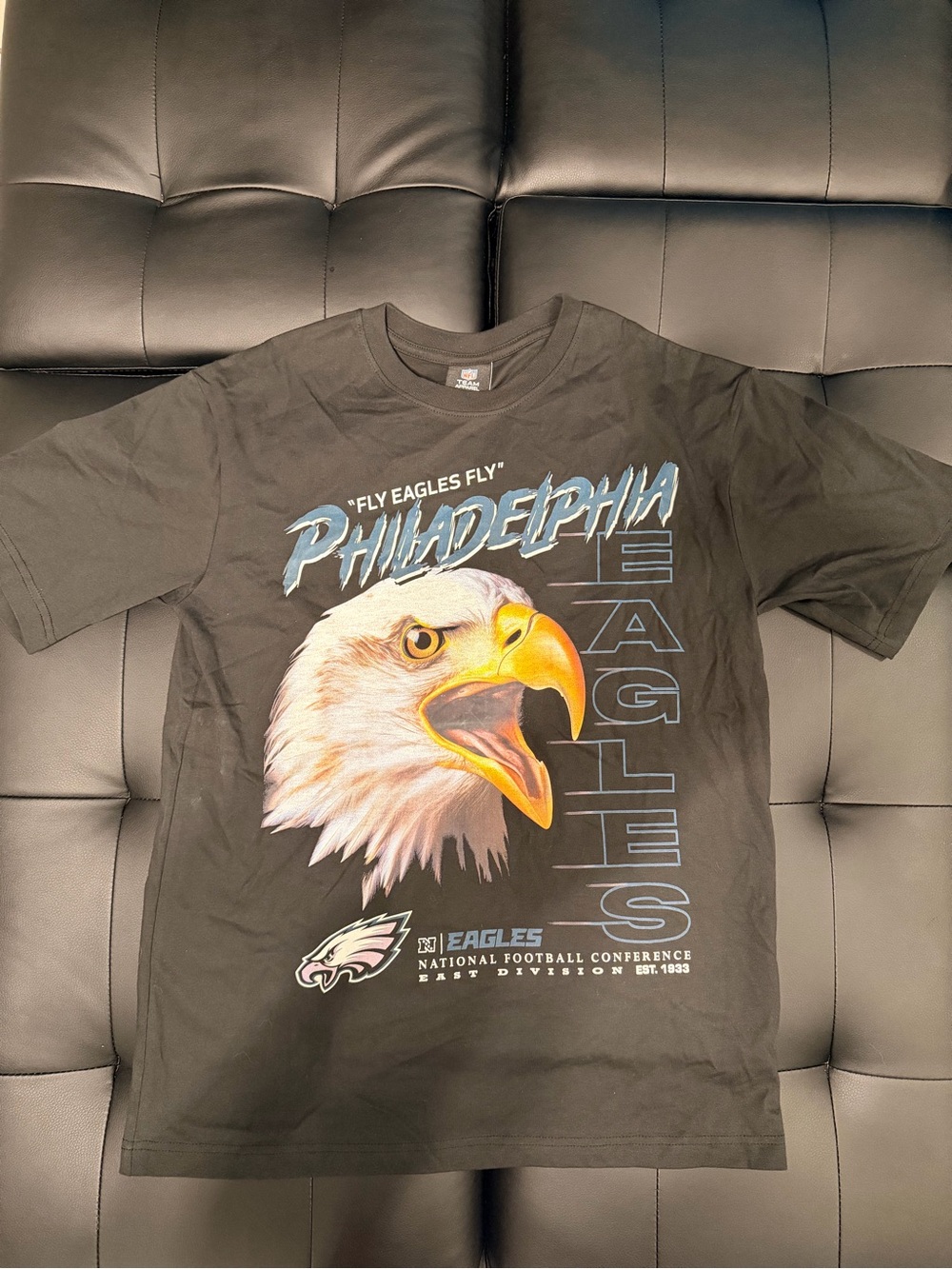 New Era Black Philadelphia Eagles NFL Team Apparel Graphic Tee with Blue Accents